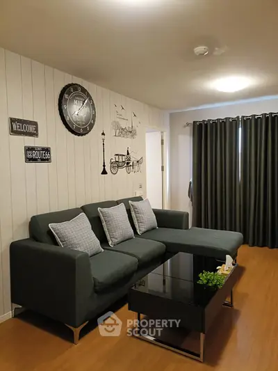 Chic living room with modern sofa and stylish decor, perfect for relaxation and entertaining.