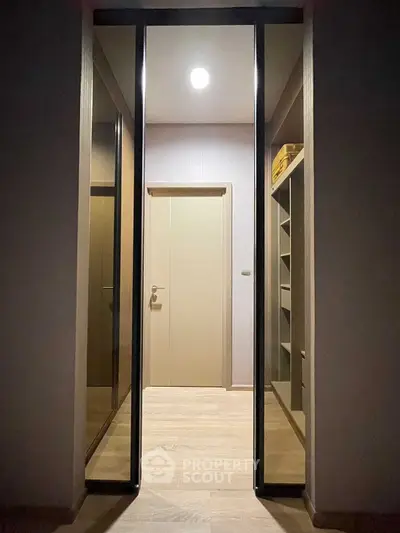 Modern walk-in closet with sleek design and ample storage space