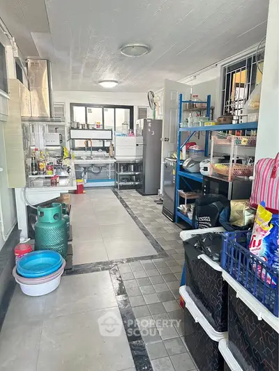 Spacious kitchen with open layout and modern appliances, perfect for culinary enthusiasts.