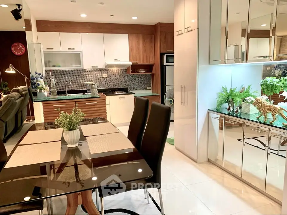 Modern open kitchen and dining area with sleek design and stylish decor