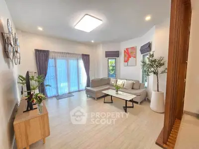 Spacious modern living room with elegant decor and natural light