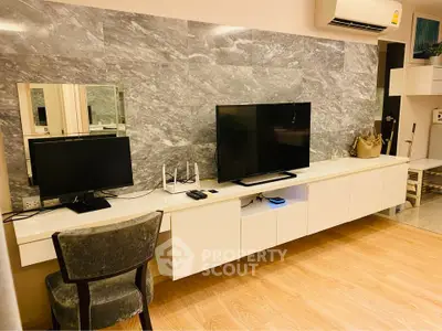 Modern living room with stylish TV setup and elegant decor