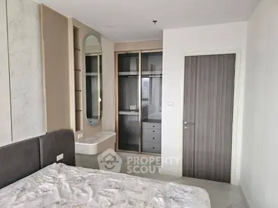 Modern bedroom with built-in wardrobe and stylish decor