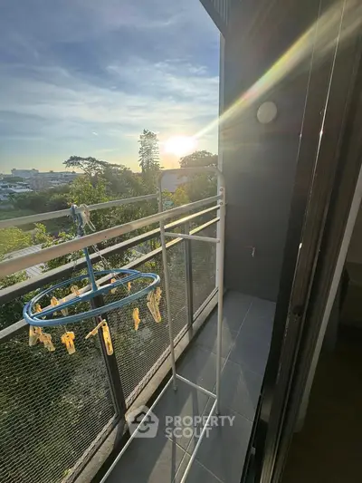 Charming balcony with scenic view, perfect for relaxation and enjoying sunsets.