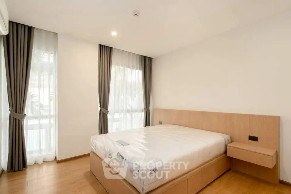 Spacious bedroom with modern design and natural light