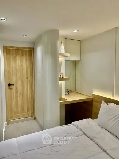 Cozy bedroom with modern design and built-in study nook