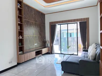 Modern living room with large windows and stylish decor