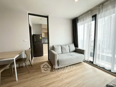 Modern living room with balcony view in high-rise apartment