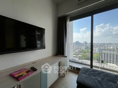 Modern living room with city view and large window balcony access