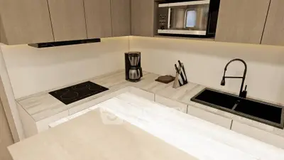 Modern kitchen with sleek appliances and stylish cabinetry