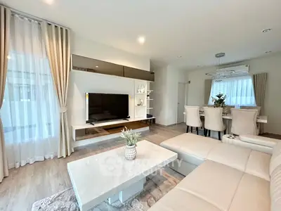 Luxurious modern living room with elegant dining area and stylish decor