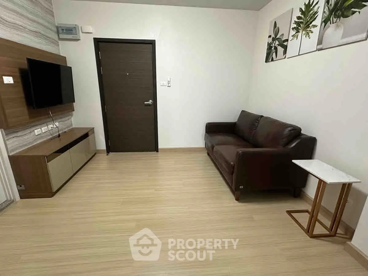 Modern living room with sleek furniture and stylish decor, perfect for contemporary living.