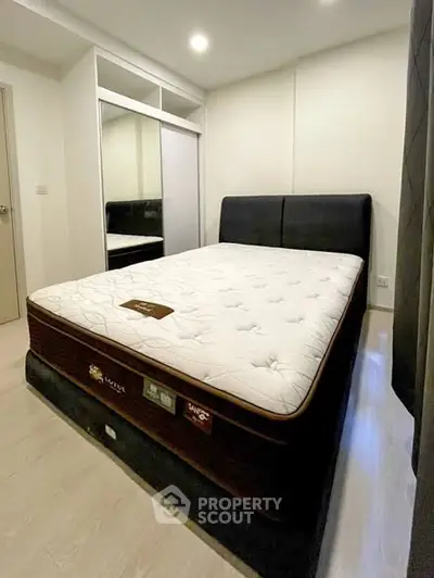 Spacious bedroom with modern design and comfortable mattress