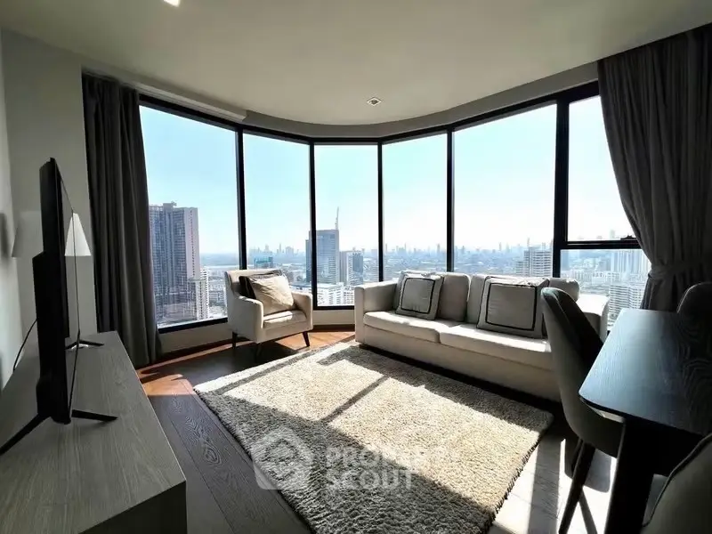 Luxurious living room with panoramic city views and modern furnishings