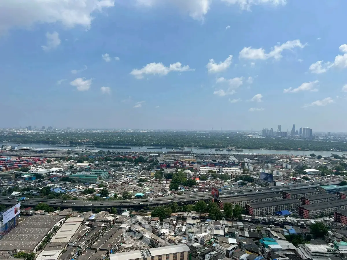 Stunning panoramic cityscape view with river and skyline, perfect for urban living enthusiasts.