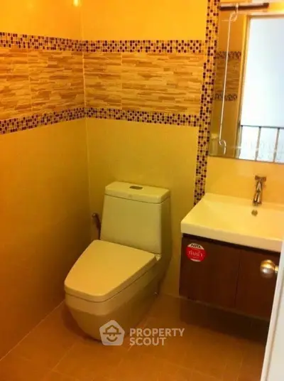 Modern bathroom with sleek fixtures and stylish tile design