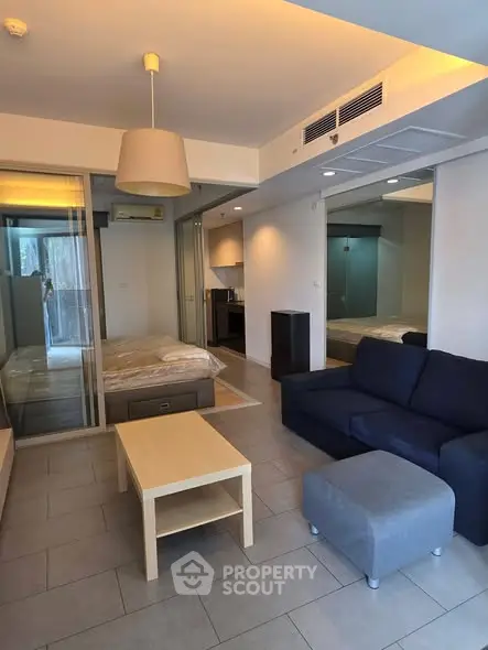 Modern studio apartment with open layout and stylish furnishings