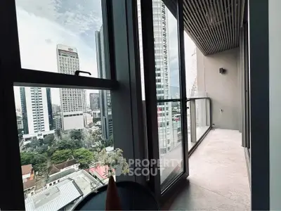 Modern high-rise apartment balcony with stunning cityscape view