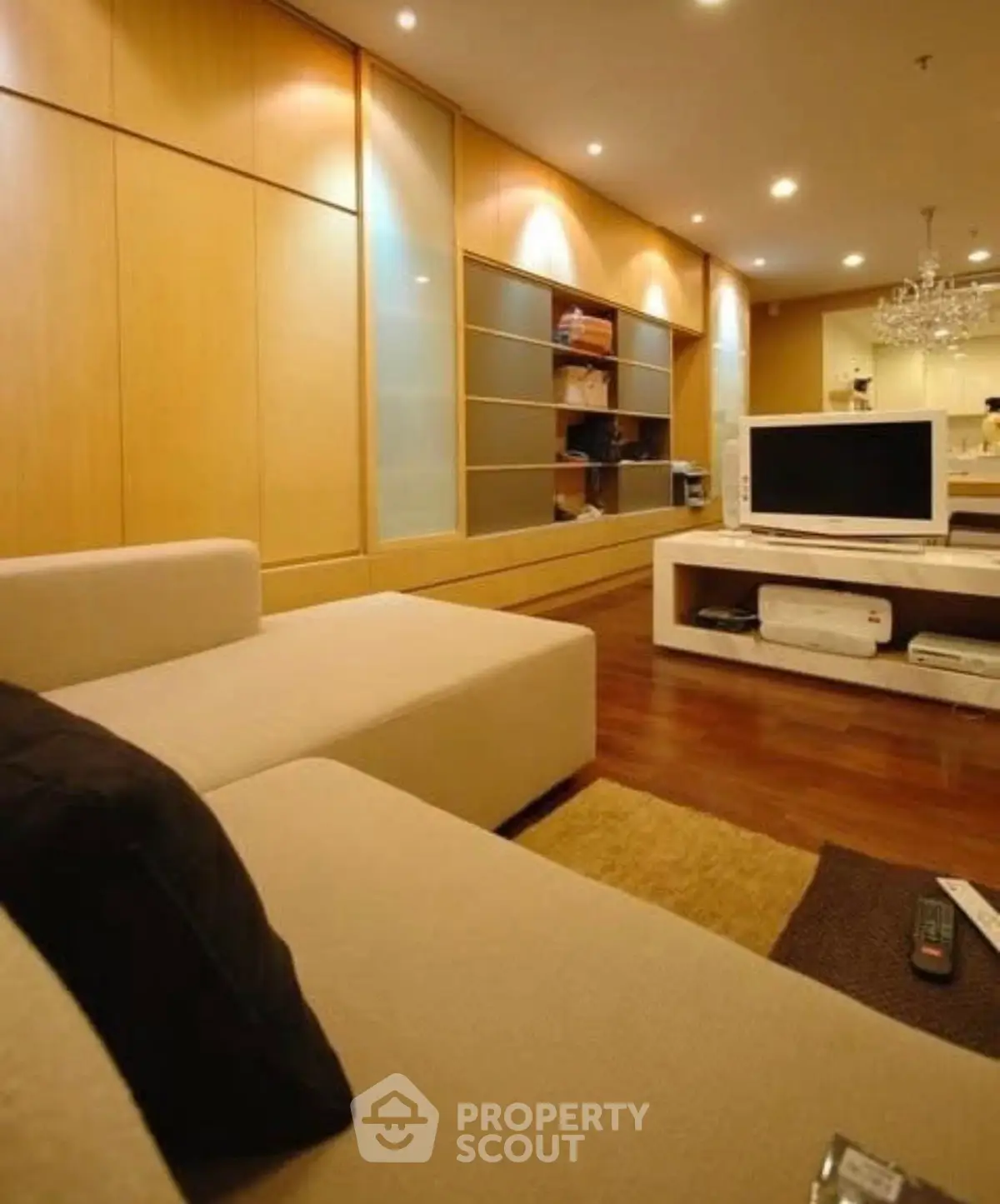 Modern living room with sleek design and cozy seating area