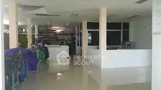 Spacious open-plan interior with modern design and ample natural light.