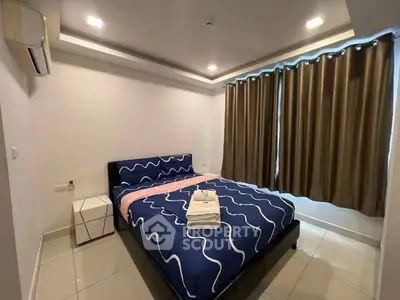 Modern bedroom with stylish bedding and elegant curtains