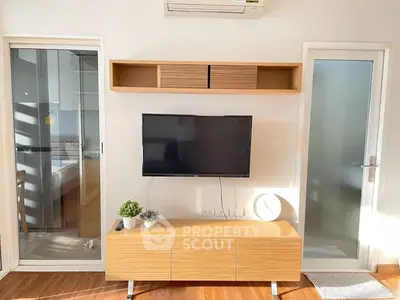 Modern living room with wall-mounted TV and wooden furniture