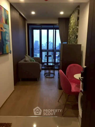 Stylish modern apartment with city view, featuring cozy living area and vibrant decor.