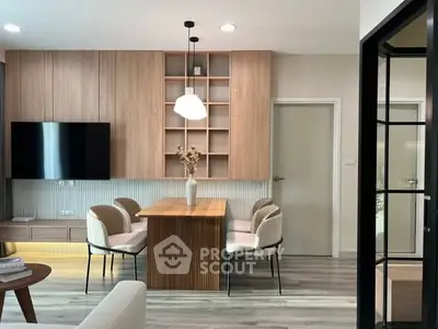 Modern living room with stylish dining area and wooden accents