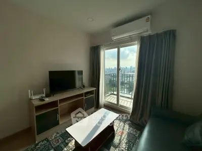 Modern living room with balcony view and sleek furniture