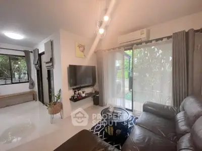 Modern living room with large windows and stylish decor