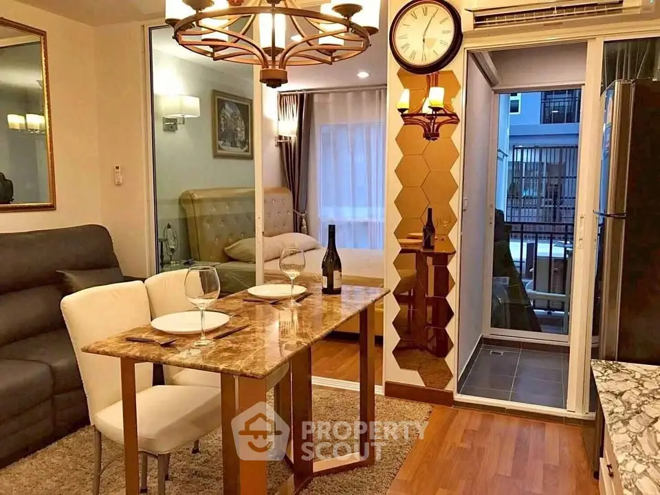 Chic modern apartment interior with elegant dining area and cozy bedroom view.
