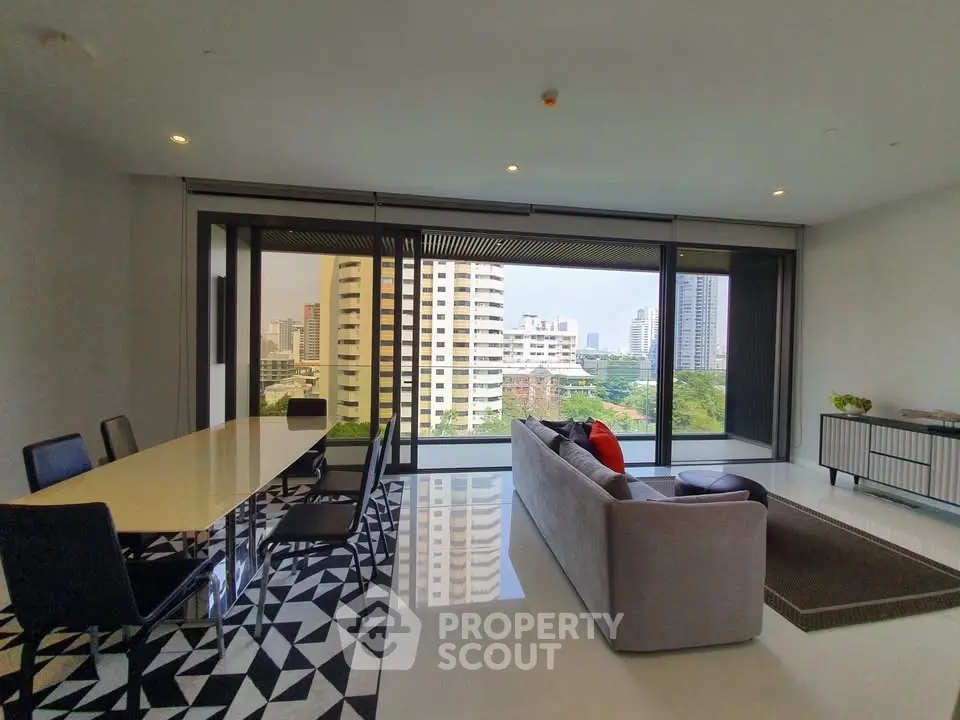 Luxurious modern living room with stunning city view and elegant decor