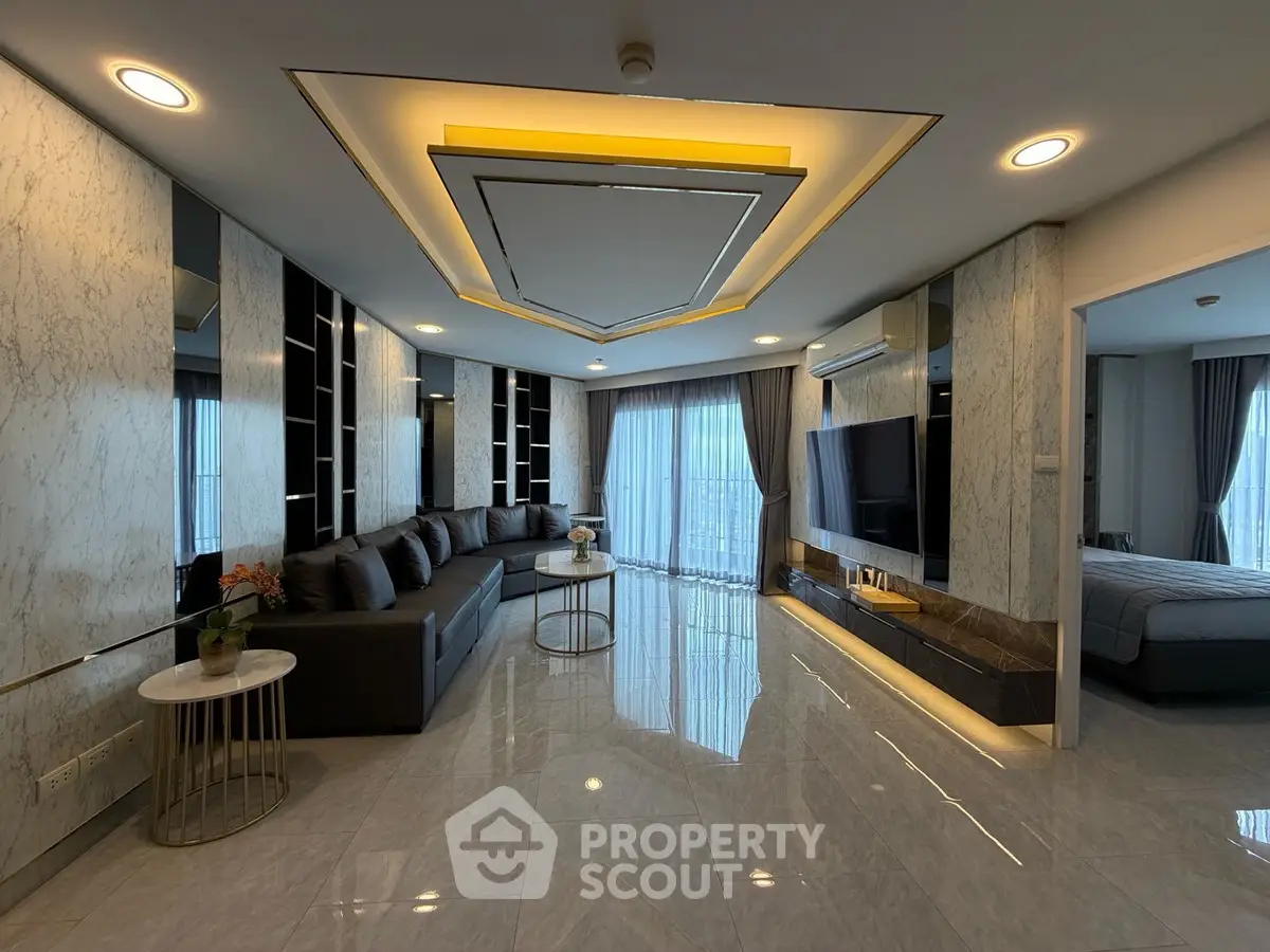 Luxurious modern living room with sleek design and large windows