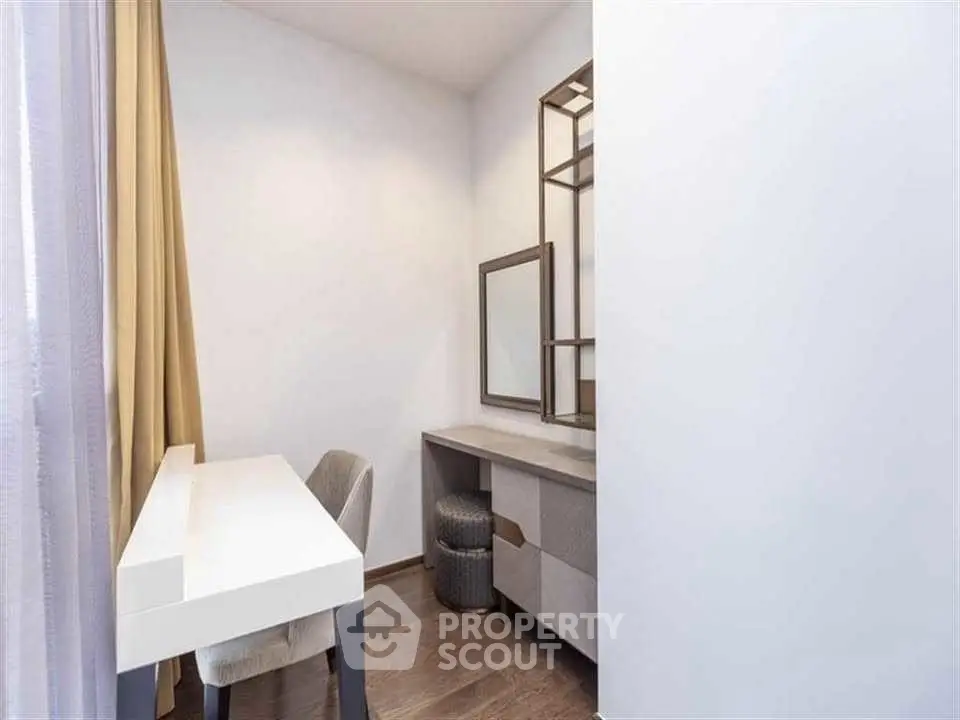 Modern study room with sleek desk and chair, ideal for productivity.
