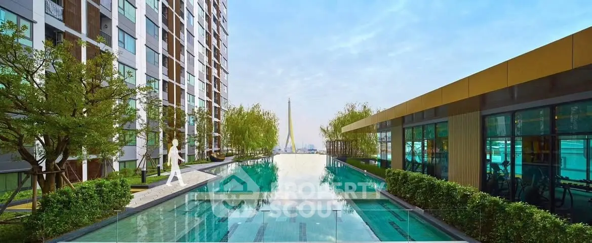 Luxurious apartment complex with stunning pool and modern architecture