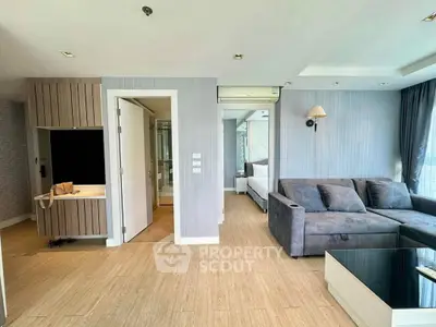 Modern living room with stylish decor and cozy sofa in a bright apartment
