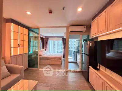 Modern apartment interior with open living room and bedroom, featuring large windows and city view.