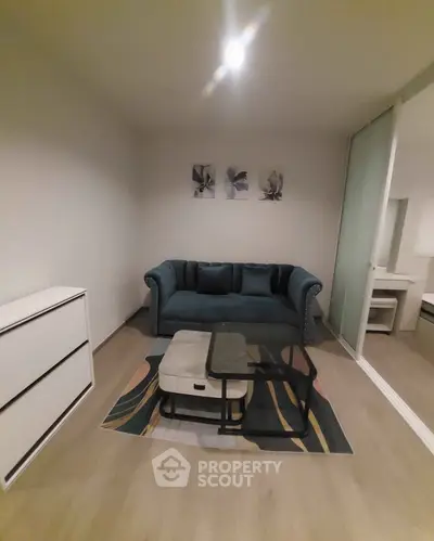 Cozy living room with stylish sofa and modern decor