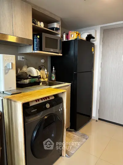 Modern kitchen with sleek appliances and efficient storage solutions