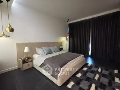 Luxurious bedroom with elegant decor and plush bedding