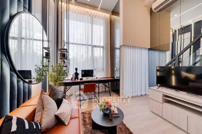 Luxurious modern living room with high ceilings and stylish decor