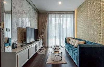 Luxurious living room with elegant decor and large window view
