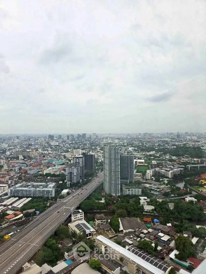 Stunning cityscape view from high-rise building showcasing urban skyline and expansive horizon.