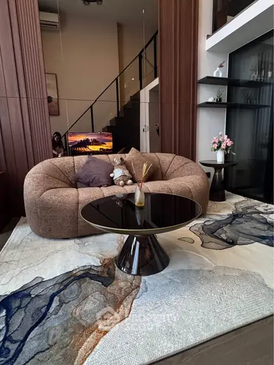 Luxurious modern living room with plush sofa and stylish decor