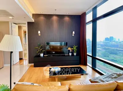Modern living room with panoramic city view and stylish decor
