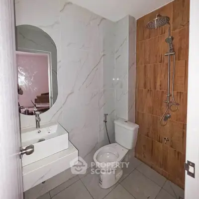 Modern bathroom with sleek fixtures and stylish tile design