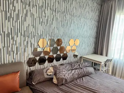 Stylish bedroom with geometric mirror decor and modern furnishings