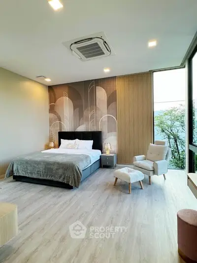 Luxurious modern bedroom with stylish decor and large window view