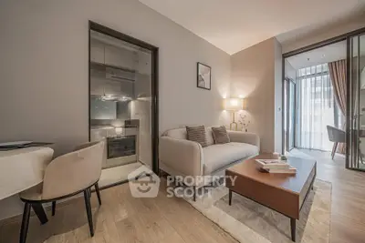 Modern living room with cozy sofa and stylish decor in a contemporary apartment.