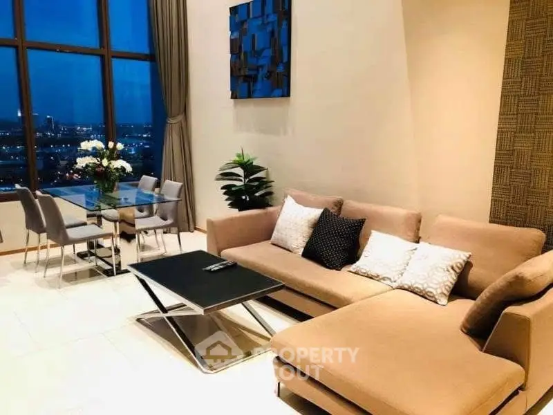Luxurious living room with modern decor and stunning city view